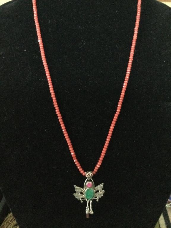 Lot 152: Ruby Necklace with Sterling Pendant