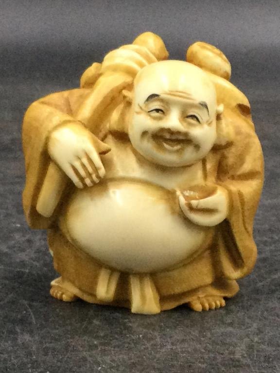 Lot 191: Early Carved Netsuke Budha