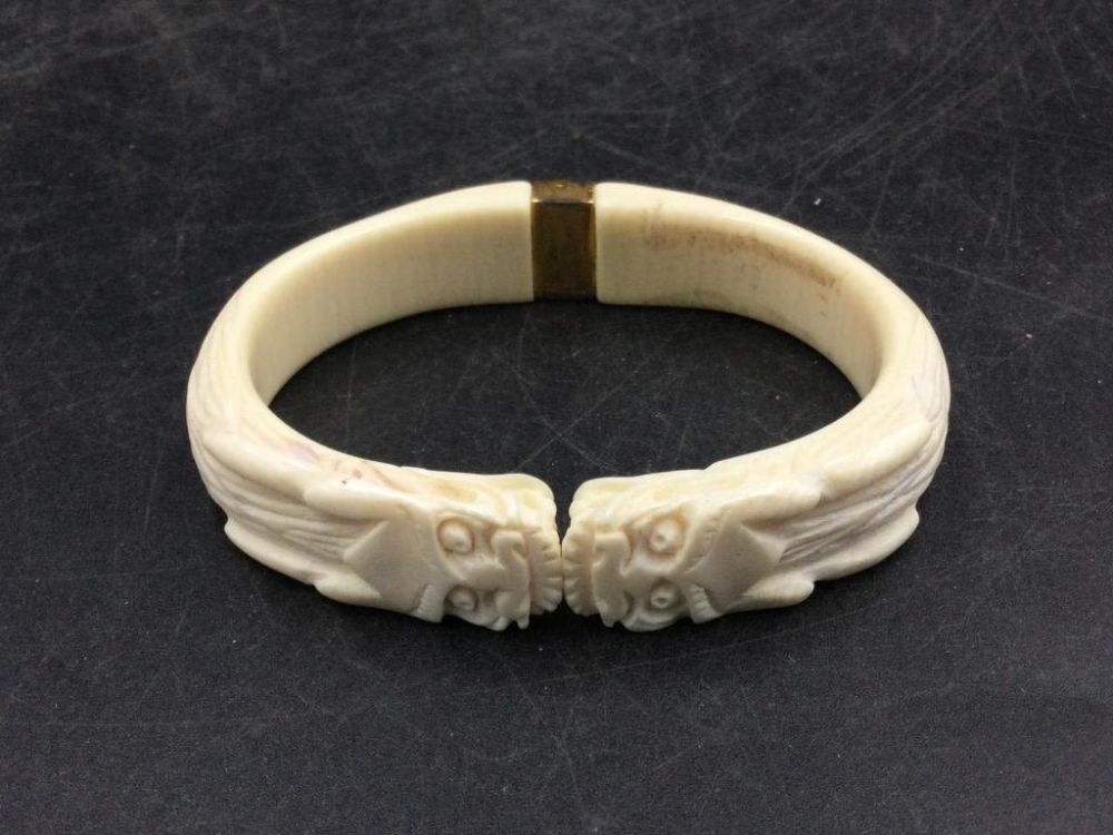 Lot 210: Vintage Ivory Carved Dragon Bracet