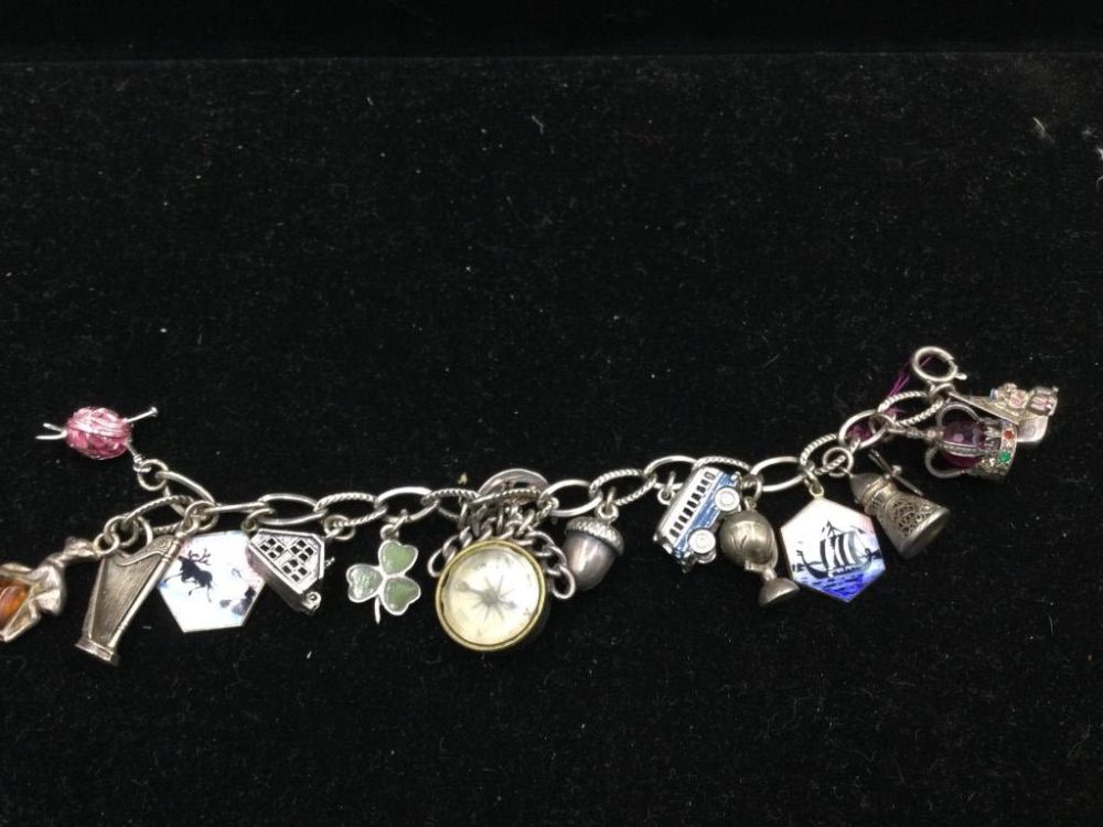 Lot 236: Sterling Charm Bracelet