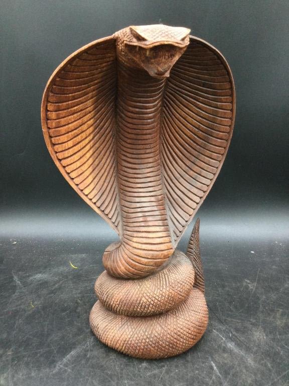 Lot 265: Carved Cobra Teak ?