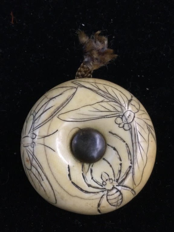 Lot 198: Vintage Scrimshaw Donut Button/Pendant From Samurai Sword