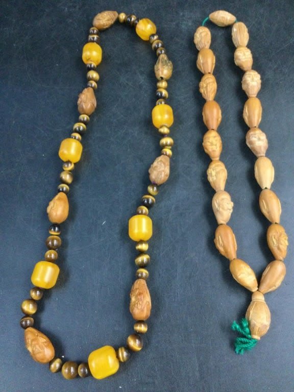Lot 183: Carved Necklaces with Butterscotch Amber