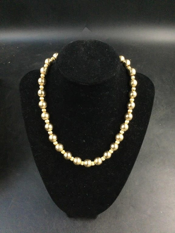 Lot 194: 14kt Gold Bead Necklace