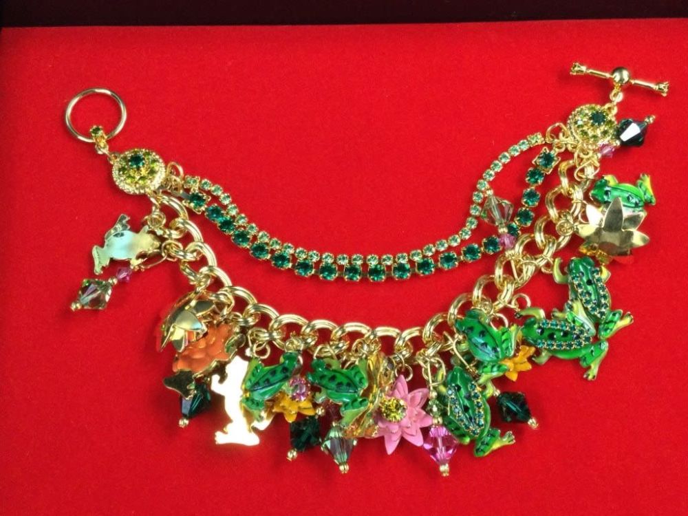 Lot 217: Lunch at the Ritz Frog Charm Bracelet