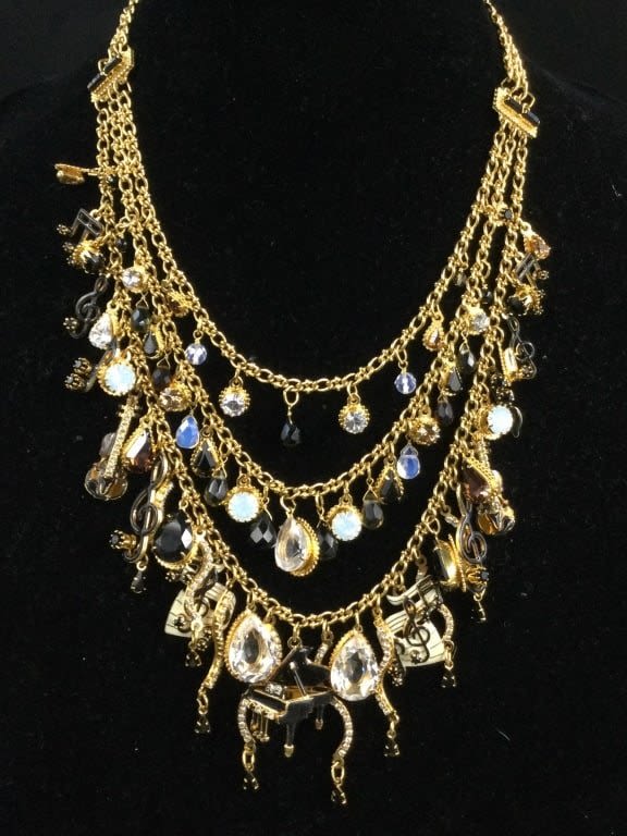 Lot 251: Lunch at the Ritz Musical Necklace