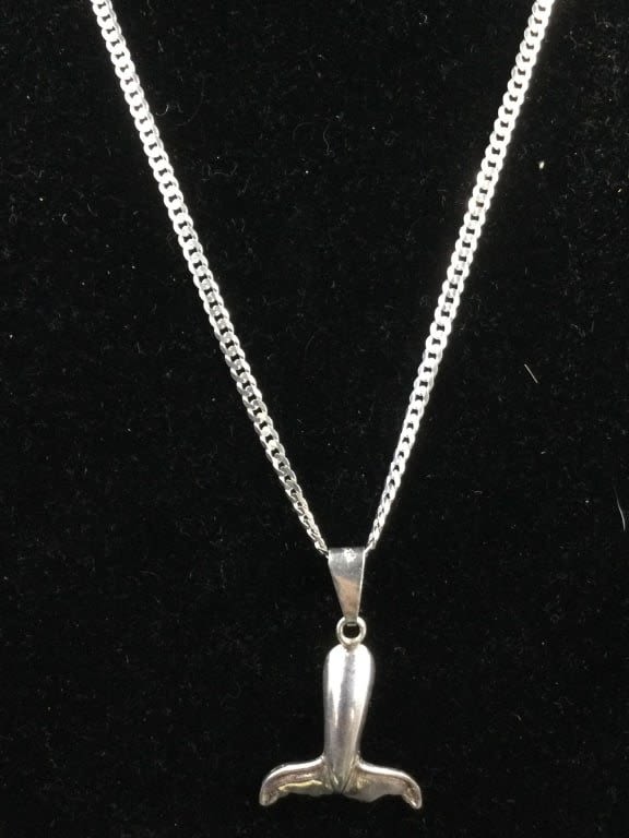 Lot 279: Sterling Chair with Whale Tail Pendant