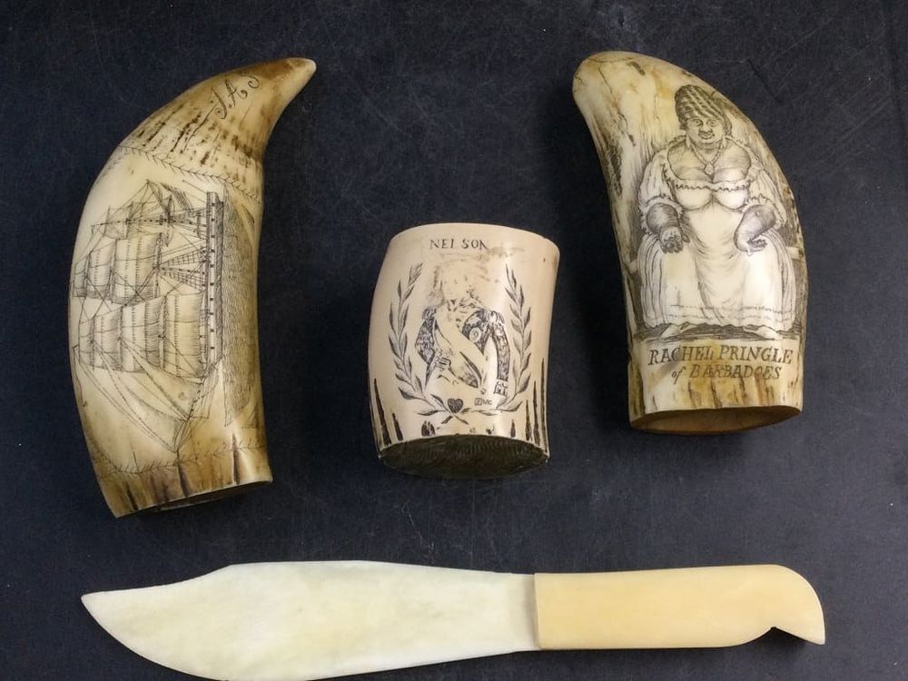 Lot 235: Scrimshaw Replica Tusks
