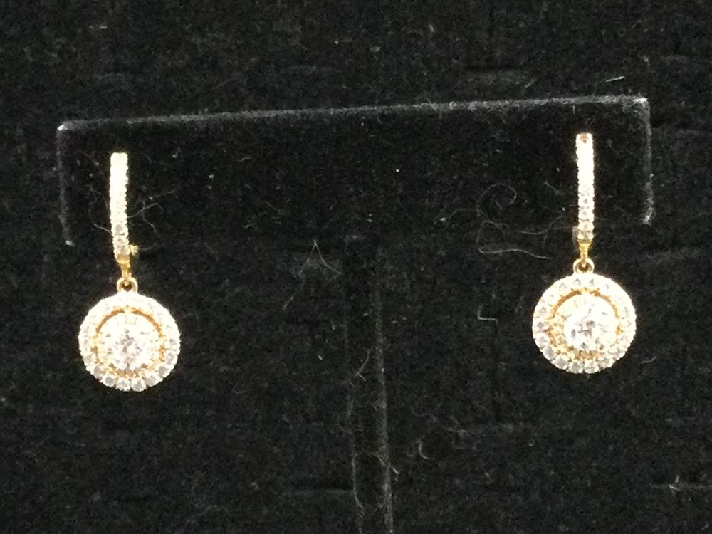 Lot 157: 14kt Diamonds earrings