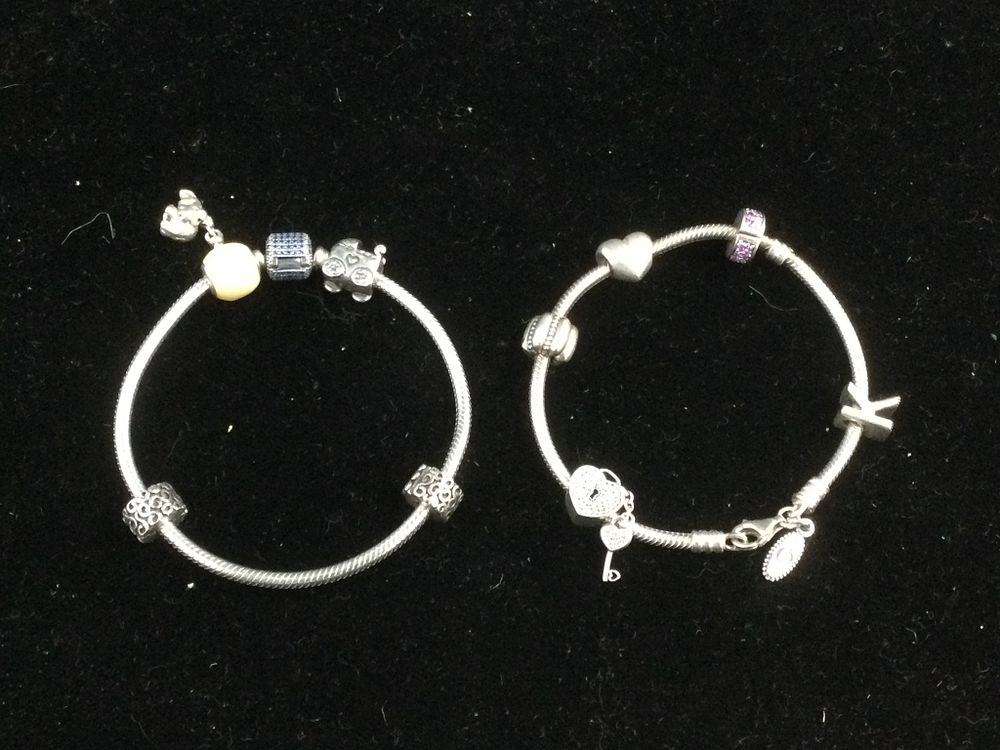 Lot 266: Pandora Sterling Bracelets iwth Charms