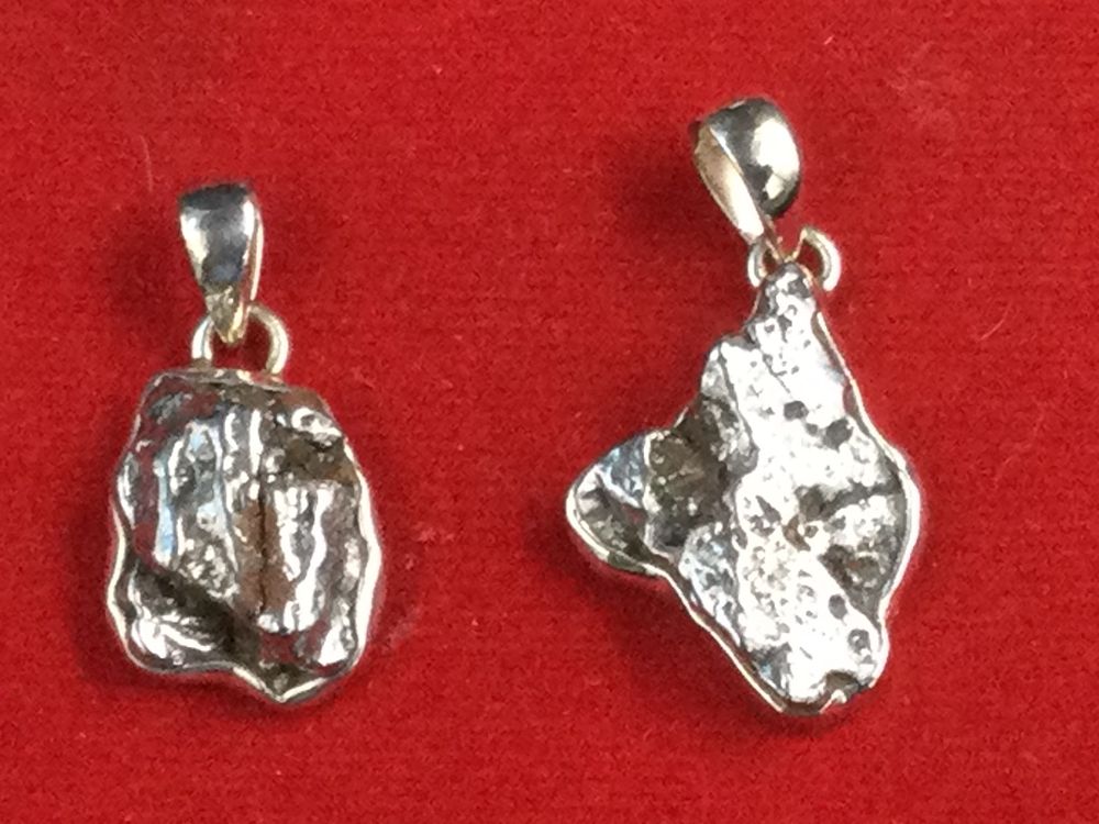 Lot 282: Sterling Pendants with Meteorites