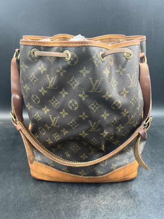 Lot 241: Vintage Louis Vuitton Drawstring Bucket Bag