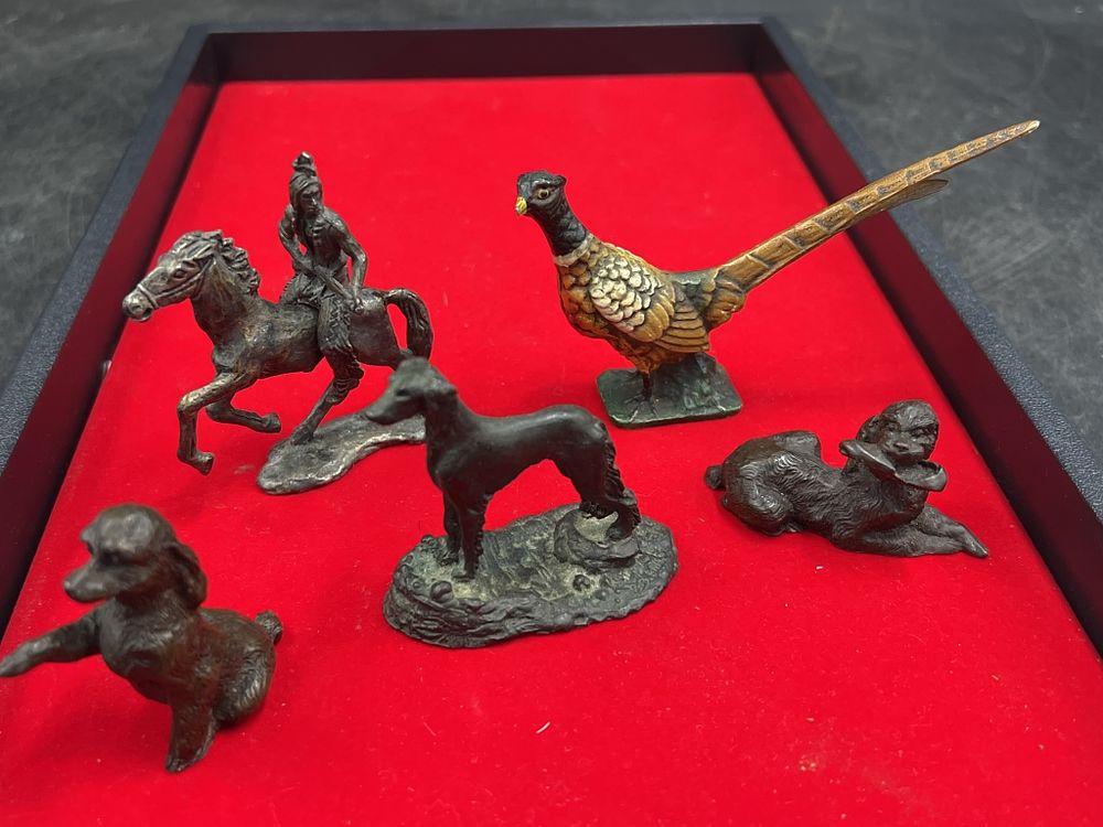 Lot 261: Miniature Bronze Figures.