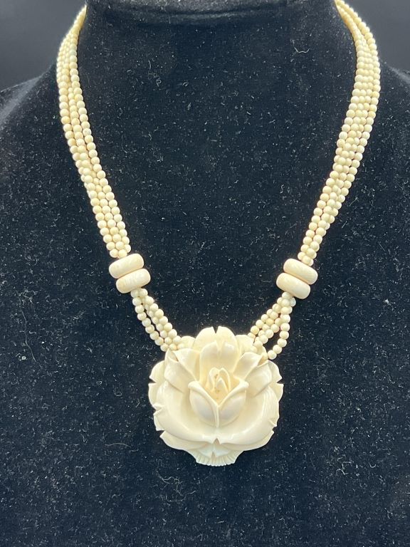 Lot 298: Carved Ivory Flower Necklace