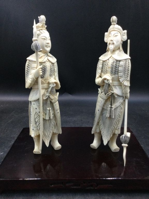 Lot 311: Carved Ivory Pair  Warriors