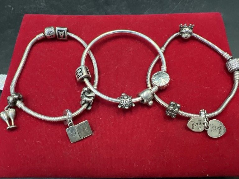 Lot 163: Pandora Charm Bracelets wtih Charms