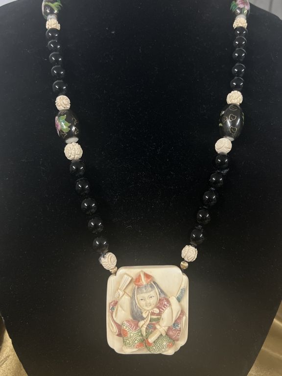 Lot 171: Carved Iovry Pendant with Onyx Beads Signed