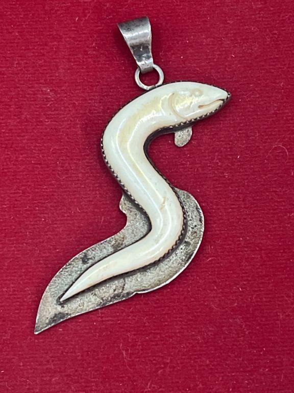 Lot 175: Carved Ivory Eel and Sterling Pendant Signed William