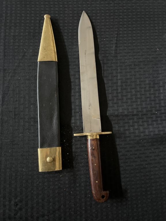 Lot 208: Sword with Leather Scabbard