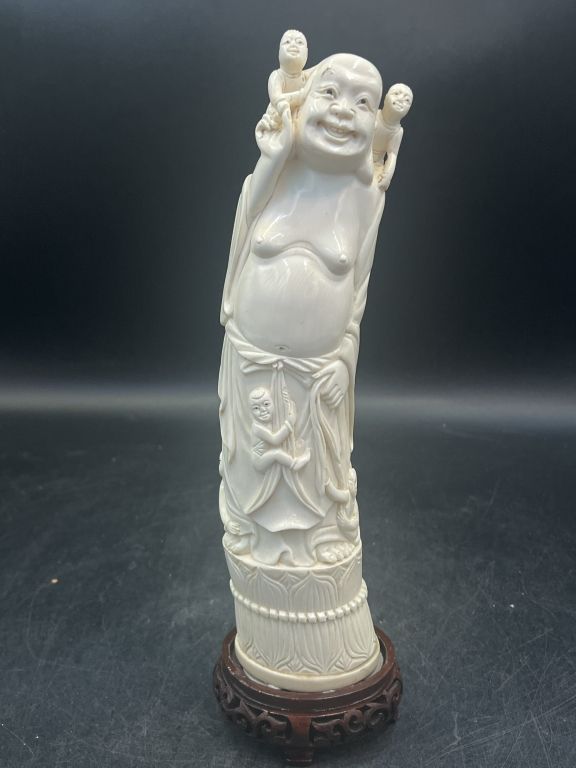 Lot 242: Ivory Carving of Maitreya with 5 Children