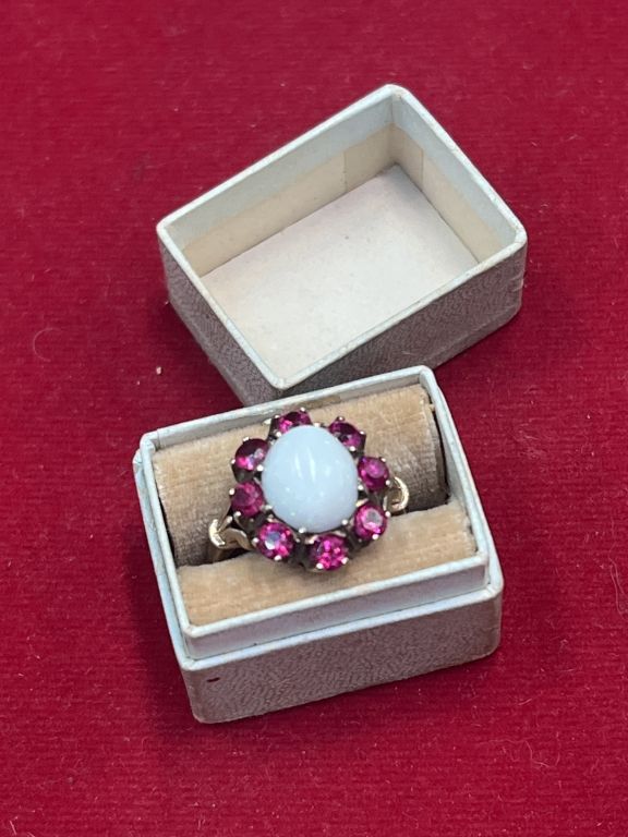 Lot 301: 10kt Gold Opal Ring with Rubies