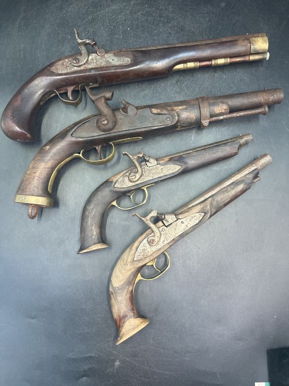 Lot 309: Vintage Black Powder Pistols