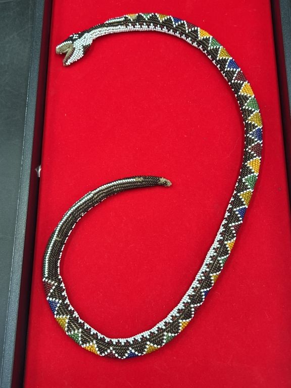 Lot 258: Early Native American Beaded Amulet