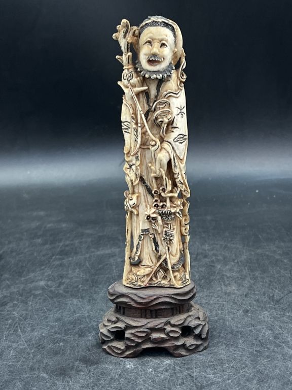 Lot 288: Early Carved Asian Figue