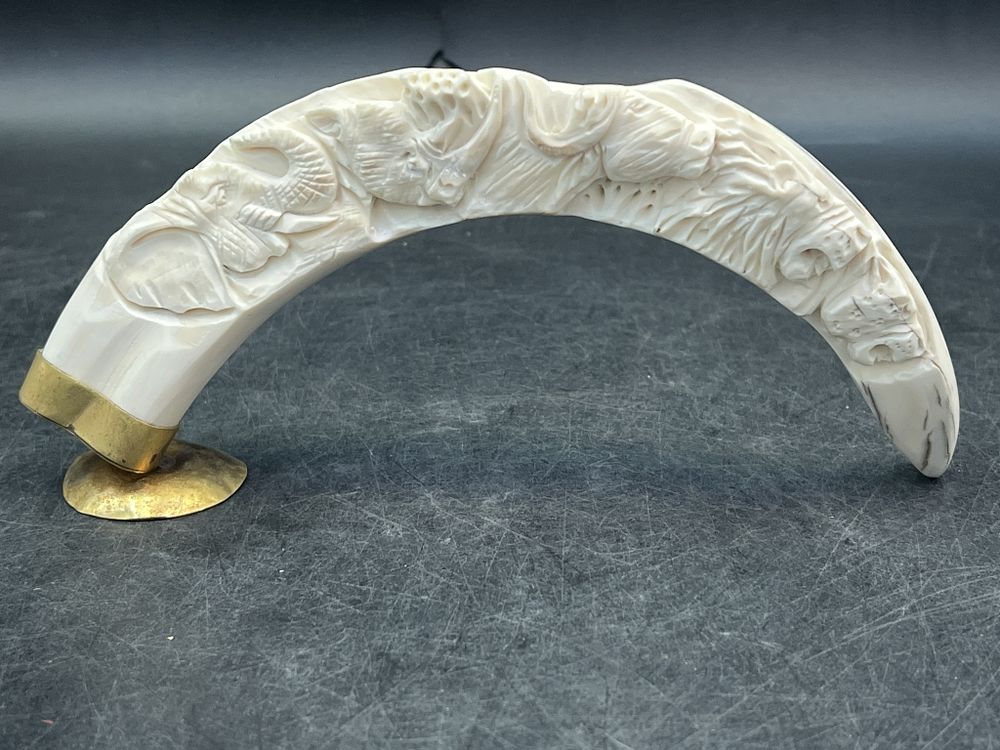 Lot 302: Carved War Hog Tusk on Stand