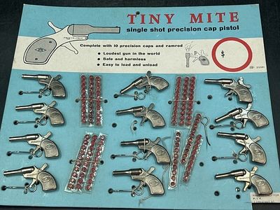 Vintage Tiny Mite Single Shot Precision Cap Pistol. Miniature toy cap gun display includes cap