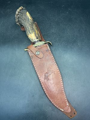 Colt Bowie Knife. Inscribed on blade CT843 and Colt since 1835. Comes with original sheath.