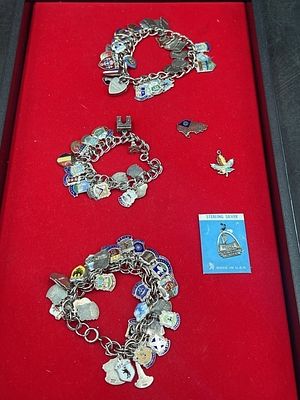 Sterling Charm Bracelets. Total of 3 silver bracelets and multiple charms some loose in this