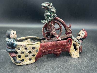 Vintage Cast Iron Mechanical Bank. Professor Pug Frogs Great Bicycle Feat Cast Iron Bank. Dated