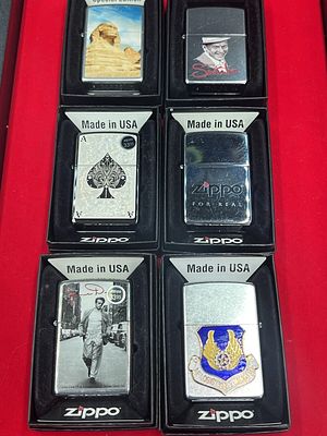 Zippo Lighters. Total of 6 in this lot. All come with original boxes and are in new condition.