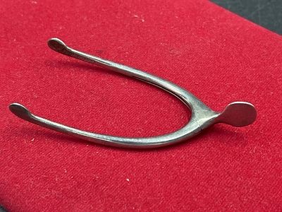 Sterling Wishbone Sugar Tongs. Wishbone sugar tongs. Weighs 15.8g and measures 3 1/4" x 1 1/2".