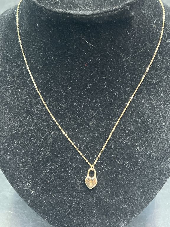 Lot 180: 14kt Necklace with Heart Pendant