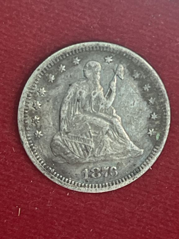 Lot 227: 1876 Seated Liberty Quarter