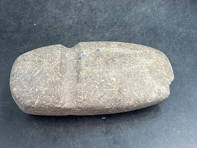 Native American Full Groved Stone Axe Head. Tools used by indigenous people for chopping trees 