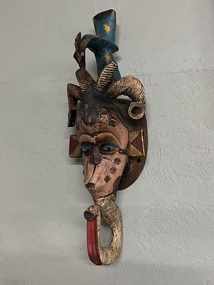 African Guro Tribal Mask. Hand carved from wood and painted with natural pigments. Distinctive 