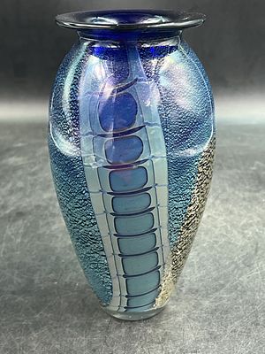 Robert Eickholt Studio Art Glass Vase. Features deep blue, teal and gold iridescent design. 