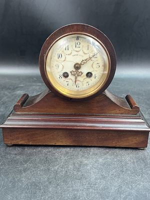 Vintage Tiffany and Co Mantle Clock. Nice older piece that is a wood base. Measures 8 1/4" x 10" 