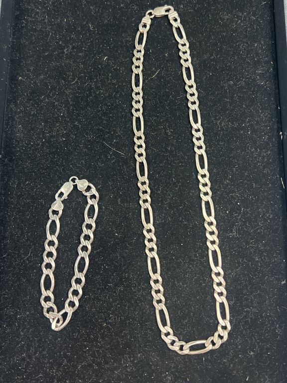 Lot 209: Sterling Silver Figaro Chain Necklace and Bracelet