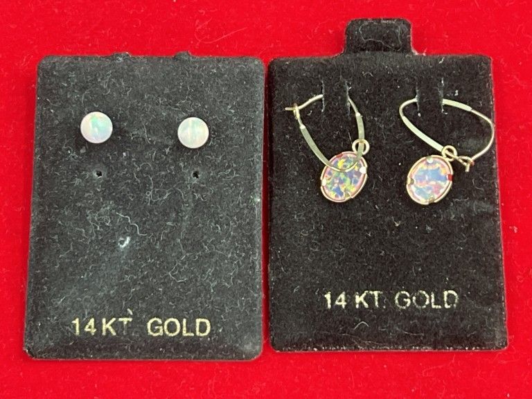 Lot 280: 14kt Gold Opal Earrings