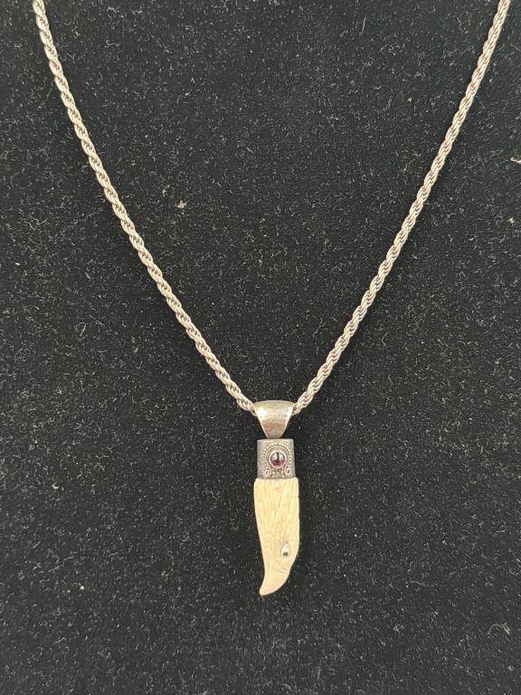 Lot 154: Sterling Silver Chain with Tooth Pendant