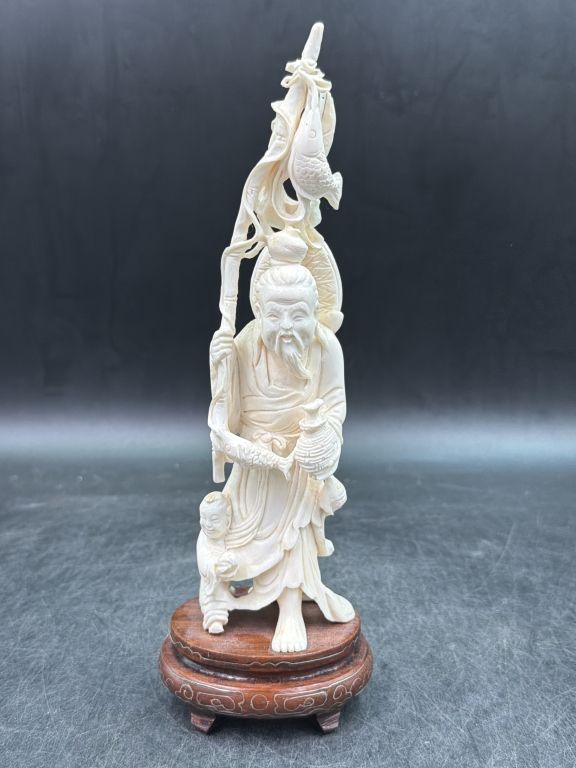 Lot 169: Antique Ivory Fisherman Figurine "Shou Lao"
