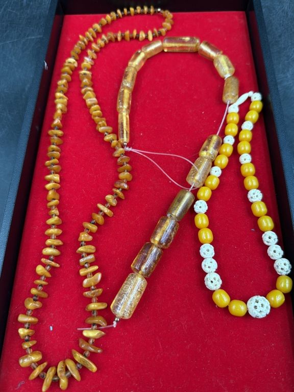 Lot 239: Vintage Amber Necklaces