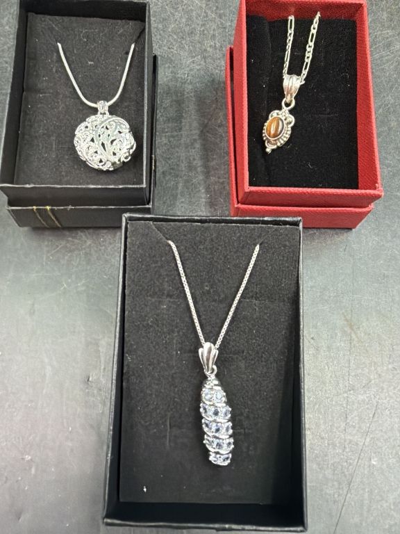Lot 278: Sterling Jewelry Chains with Pendants