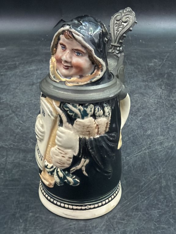 Lot 304: Antique German Figural Stein