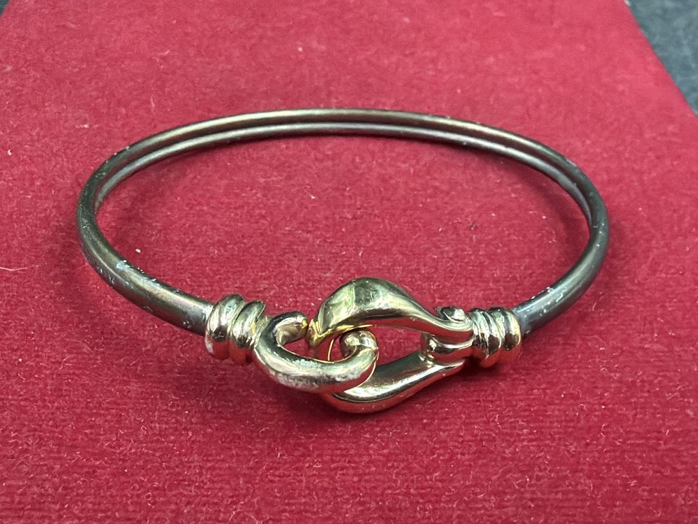 Lot 351: Sterling Silver and 14kt Gold Bangle Bracelet