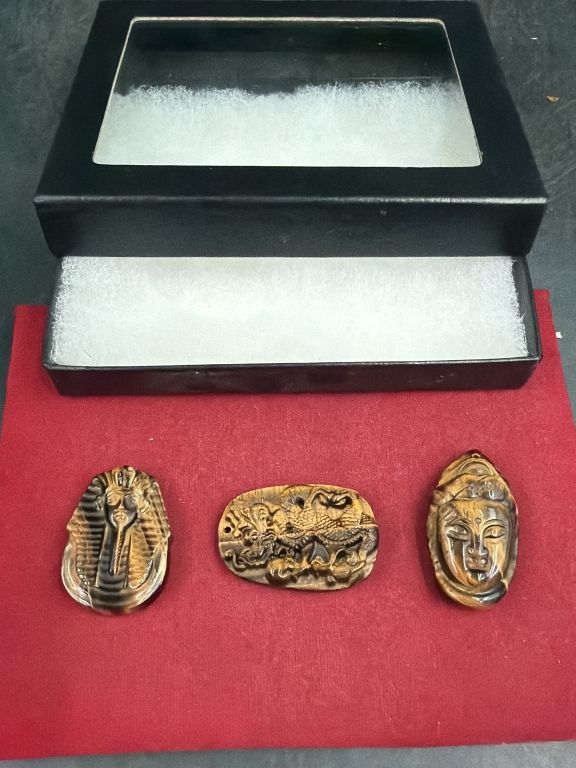 Lot 353: Tiger Eye Pendants
